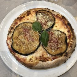 Sud Pizza- i got the "baby version" which was more than enough for me. The regular sized portion is a bit bigger