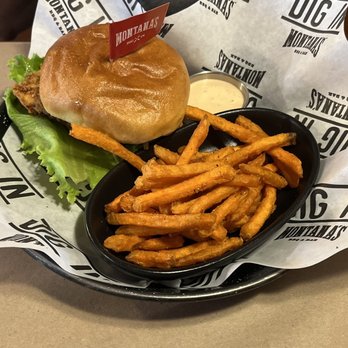 Montana's BBQ & Bar - Sweet potatoes fries and crispy chicken burger - Canadian (New) Near Me - Ottawa, Ontario
