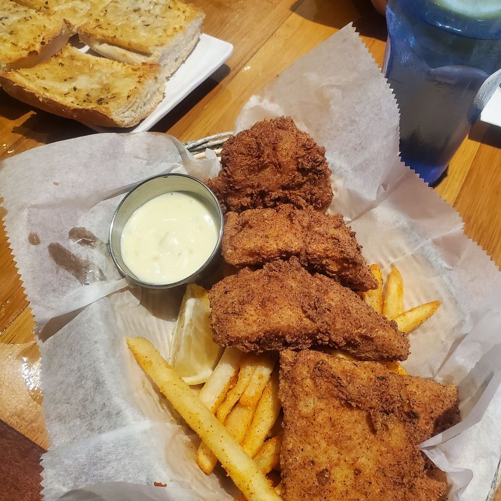DELICIOUS catfish and fries and garlic bread. DELICIOUS catfish and fries and garlic bread.