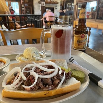 Goode Company Barbeque - Chopped brisket po-boy, potato salad and Shiner Bock, with a slice of pecan pie for later! - Barbeque Near Me - Houston, Texas Goode Company Barbeque - Chopped brisket po-boy, potato salad and Shiner Bock, with a slice of pecan pie for later! - Barbeque Near Me - Houston, Texas