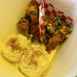 Crispy & delicious. The neon sign gave it a yellow hue. | Box Original Garlic Butter & Spicy Garlic Butter