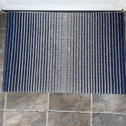 Rowan Chase Studio - The front door rug, a few to choose from