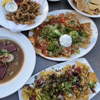 Yard House - happy hour : poke nachos, ahi sashimi, calamari, chicken nachos, four cheese spinach dip, chicken tenders - New American Near Me - Irvine, California Yard House - happy hour : poke nachos, ahi sashimi, calamari, chicken nachos, four cheese spinach dip, chicken tenders - New American Near Me - Irvine, California