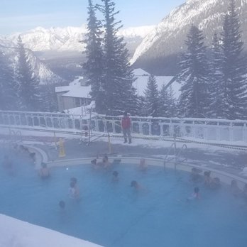 Banff Upper Hot Springs - The outdoor pool with a mountain view - Day Spas Near Me - Banff, Alberta Banff Upper Hot Springs - The outdoor pool with a mountain view - Day Spas Near Me - Banff, Alberta