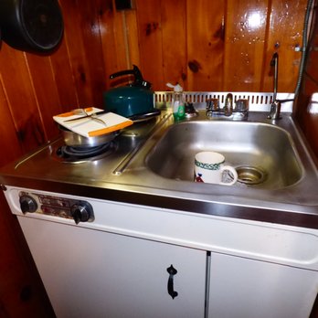 Sun Valley Cottages - I used the saucepan with cutting board as my drainboard to dry the silverware - Guest Houses Near Me - Weirs Beach, New Hampshire Sun Valley Cottages - I used the saucepan with cutting board as my drainboard to dry the silverware - Guest Houses Near Me - Weirs Beach, New Hampshire