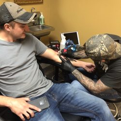 Untold Pain Tattoo Studio - Corey getting a tattoo by James!