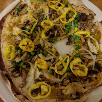 Aladdin's Eatery - Chicken Curry Pizza (so good, I had to take a bite before a pic) - Mediterranean Near Me - West Chester, Ohio Aladdin's Eatery - Chicken Curry Pizza (so good, I had to take a bite before a pic) - Mediterranean Near Me - West Chester, Ohio