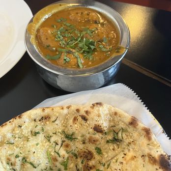 Taj Indian Cuisine - Malai Kofta and garlic naan - Indian Near Me - Davenport, Florida Taj Indian Cuisine - Malai Kofta and garlic naan - Indian Near Me - Davenport, Florida
