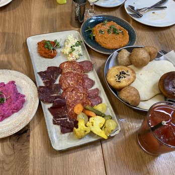 AMBAR Restaurant, Capitol Hill - Charcuterie board, bread basket and Bloody Mary - Modern European Near Me - Washington, DC, District of Columbia
