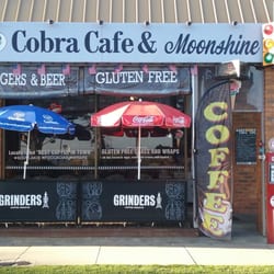 Cobra Cafe & Moonshine - Take a look at this Café, it has a great wall & great menus