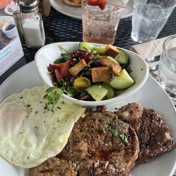 Vic's - Medium rare Ribeye steak with eggs and salad. - Breakfast & Brunch Near Me - Martinez, California Vic's - Medium rare Ribeye steak with eggs and salad. - Breakfast & Brunch Near Me - Martinez, California