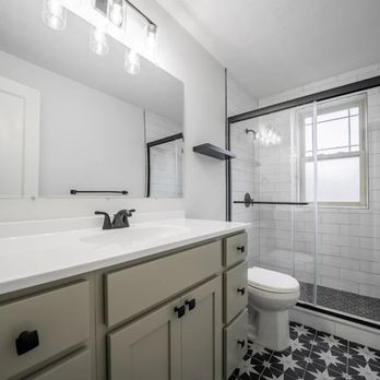 Integrity Cleveland Heights - A white sink with a black and white tiled floor. - Apartments Near Me - Cleveland Heights, Ohio Integrity Cleveland Heights - A white sink with a black and white tiled floor. - Apartments Near Me - Cleveland Heights, Ohio