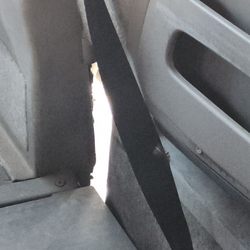 Triple M Transportation - View of the road from inside. Air conditioning via sliding van door Worn out dash