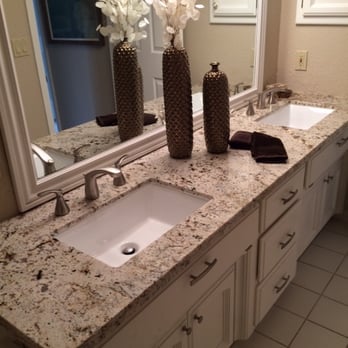 Pacific Pipes - a bathroom with two sinks and a large mirror - Plumbing Near Me - Sacramento, California Pacific Pipes - a bathroom with two sinks and a large mirror - Plumbing Near Me - Sacramento, California