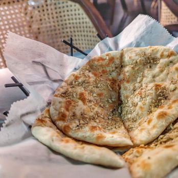 Bombay Velvet - Garlic Naan - Indian Near Me - Reston, Virginia Bombay Velvet - Garlic Naan - Indian Near Me - Reston, Virginia