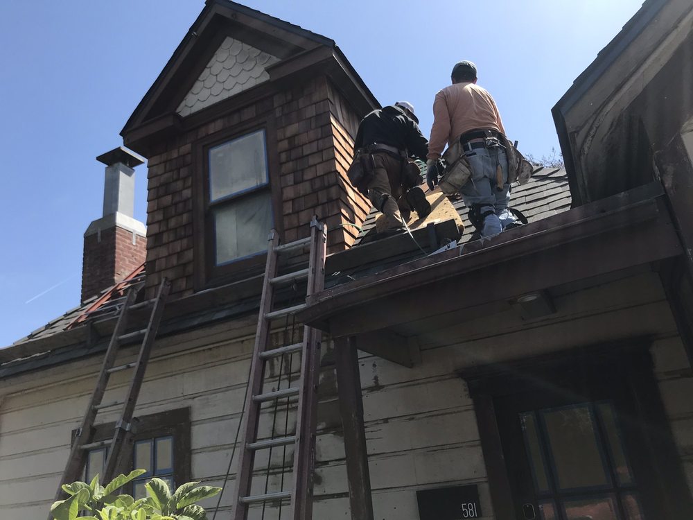 Slide of Re Roof All American