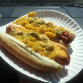 Rutt's Hut - 2 hot dogs, one with cheese, both loaded with relish and mustard - Hot Dogs Near Me - Clifton, New Jersey