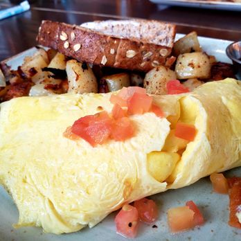 First Watch - The Works Omelet - Ham, bacon, sausage, house-roasted Crimini mushrooms, onions, tomatoes with Cheddar & Monterey Jack. - Breakfast & Brunch Near Me - Fort Mill, South Carolina First Watch - The Works Omelet - Ham, bacon, sausage, house-roasted Crimini mushrooms, onions, tomatoes with Cheddar & Monterey Jack. - Breakfast & Brunch Near Me - Fort Mill, South Carolina