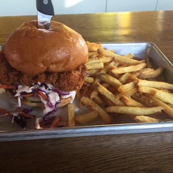 Basilisk - Fried chicken sandwich with fries - New American Near Me - Portland, Oregon Basilisk - Fried chicken sandwich with fries - New American Near Me - Portland, Oregon