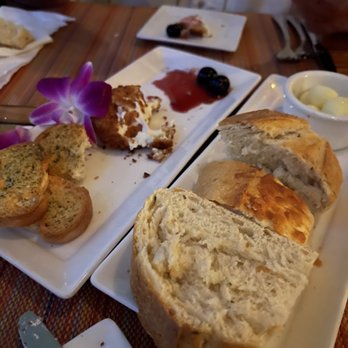 Butterfly Café - Warm goat cheese appetizer and bread service - Seafood Near Me - Marathon, Florida Butterfly Café - Warm goat cheese appetizer and bread service - Seafood Near Me - Marathon, Florida