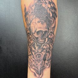 Irish Ink Tattoo - Left forearm Skull and Raven