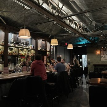 Never Never - people sitting at a bar - Bars Near Me - Nashville, Tennessee Never Never - people sitting at a bar - Bars Near Me - Nashville, Tennessee