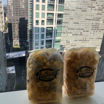 Garrett Popcorn Shops - Bag of Garrett Mix Popcorn and Bag of Limited edition spicy cheese Popcorn - Popcorn Shops Near Me - Chicago, Illinois Garrett Popcorn Shops - Bag of Garrett Mix Popcorn and Bag of Limited edition spicy cheese Popcorn - Popcorn Shops Near Me - Chicago, Illinois