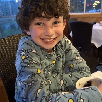 Kimberly’s at the Marina - Happy kid with a warm brownie and vanilla bean gelato dessert - Seafood Near Me - Hampden, Maine Kimberly’s at the Marina - Happy kid with a warm brownie and vanilla bean gelato dessert - Seafood Near Me - Hampden, Maine