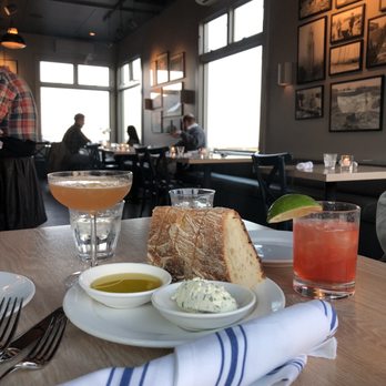 Feather & Wedge - Bread, jungle love cocktail(right)and Trinidad sour cocktail(left). - American Near Me - Rockport, Massachusetts