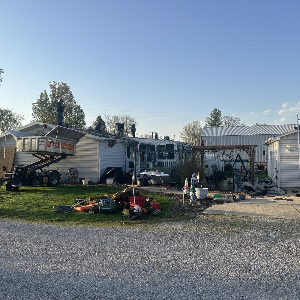 Bam Roofing and Construction - Putting new roof on house. Different angle. - Roofing Near Me - Neoga, Illinois