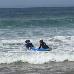 Avila Beach Surf School - Here is my instructor helping give me confidence to get on the board!