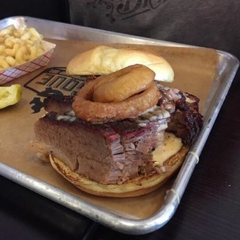 GQue BBQ Westminster - Sandwich with Brisket and onion rings plus the Mac n cheese - Barbeque Near Me - Westminster, Colorado
