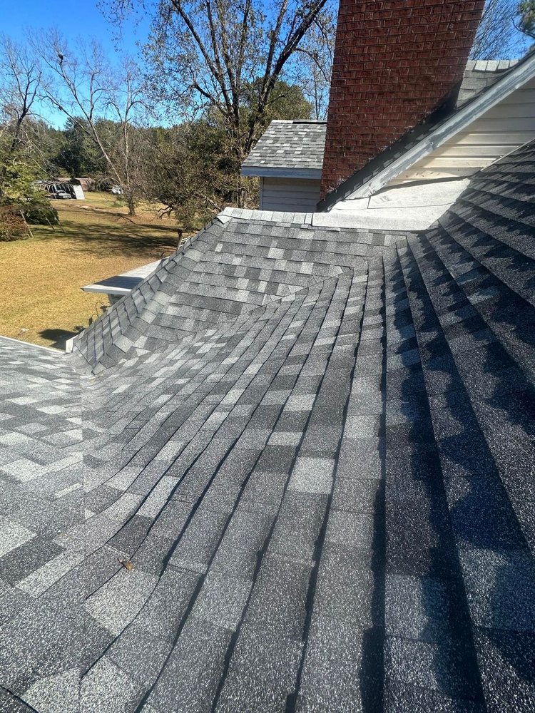 Slide of RCM Roofers