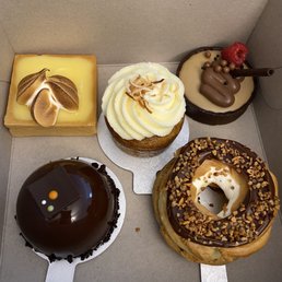 a variety of pastries in a box
