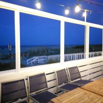 The Deck - Deck looking out to the beach - New American Near Me - Tybee Island, Georgia The Deck - Deck looking out to the beach - New American Near Me - Tybee Island, Georgia