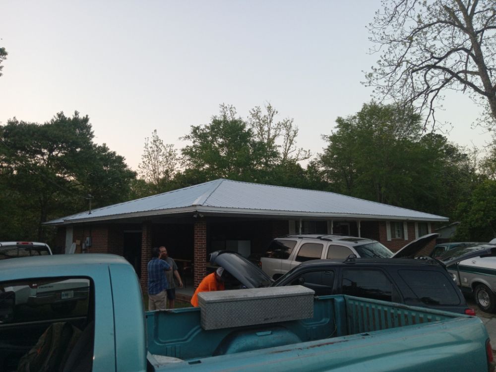 Slide of Tip Top Roofing Service
