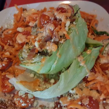 Guyutes - iceberg salad with bacon, blue cheese - Bars Near Me - Oklahoma City, Oklahoma