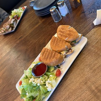 Postino Uptown Park - Gluten free Prosciutto Brie Panini (sub chicken) - Wine Bars Near Me - Houston, Texas
