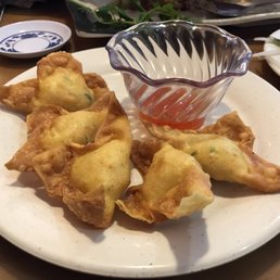 Crab Rangoon (5) Deep Fried Dumplings Filled with Combination of Cream Cheese, Crab Meat, and Scallions.