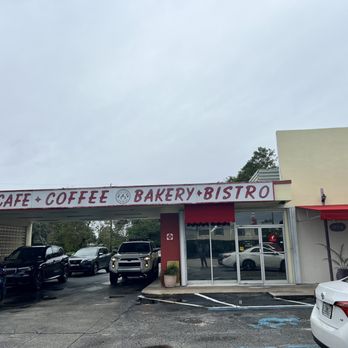 Chez Cafe - cars parked in front of the building - Cafes Near Me - Pompano Beach, Florida