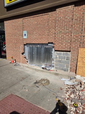 brick repair - Car hit building and we repaired it. The chimney was falling down so we built a new one. More photos to come.