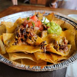 North Shore Tacos - Gnarly Nachos with sweet pork.