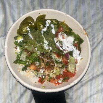 Qdoba Mexican Eats - Cilantro white rice (cant even see bc its barely any there) brisket "cheese" "sour cream" "pico de gayo" lettuce - Mexican Near Me - Fresh Meadows, New York