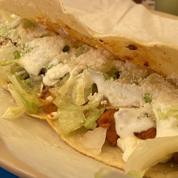 Quesadillas Doña Maty - a close up of a taco - Mexican Near Me - New York, New York