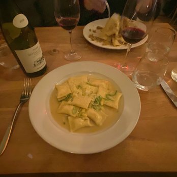 Naked Dog - Agnolotti: ricotta filled pasta with truffle butter sauce. - Italian Near Me - Brooklyn, New York Naked Dog - Agnolotti: ricotta filled pasta with truffle butter sauce. - Italian Near Me - Brooklyn, New York