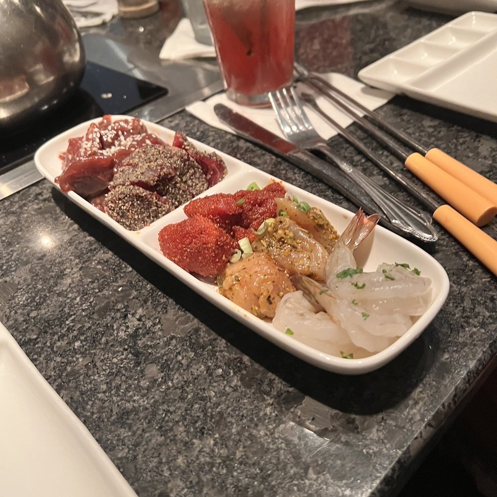 The Melting Pot - Variety of meats - Fondue Near Me - Orlando, Florida The Melting Pot - Variety of meats - Fondue Near Me - Orlando, Florida