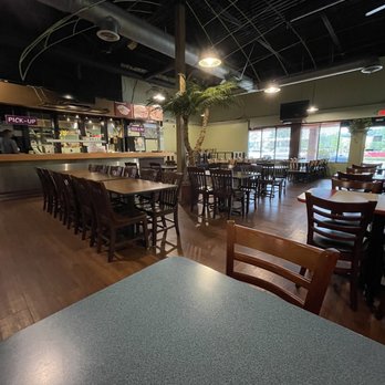 Karachi Broast & Grill - a table and chairs in a restaurant - Sandwiches Near Me - Norcross, Georgia