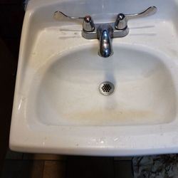 KFC - Filthy sink in men's room!