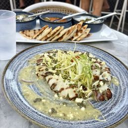 Calamari, and pita trio spread.