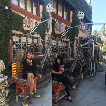 Tio's Tacos - Grounds and giant skeleton riding a bicycle at Tio's - Mexican Near Me - Riverside, California